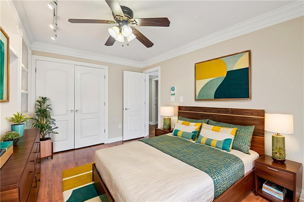 121 Fulton Way Southeast Atlanta, GA 30312 - Photo 27 of 38 a bedroom with a bed and a painting on the wall