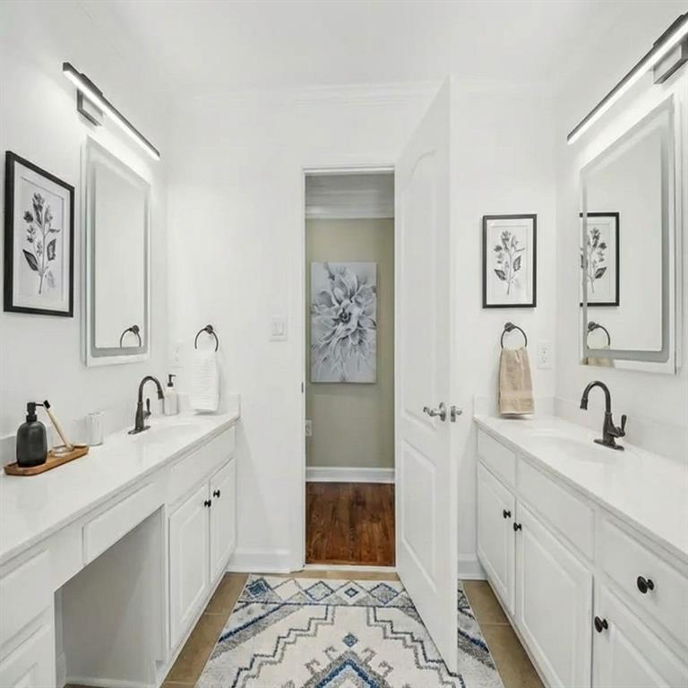 121 Fulton Way Southeast Atlanta, GA 30312 - Photo 31 of 38 a bathroom with a double vanity sink mirror and shower