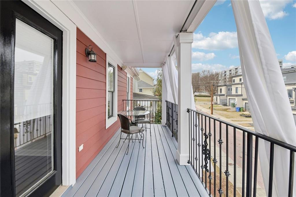 121 Fulton Way Southeast Atlanta, GA 30312 - Photo 34 of 38 a view of a balcony with wooden floor