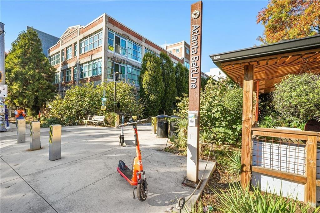 121 Fulton Way Southeast Atlanta, GA 30312 - Photo 6 of 38 a front view of a house with a yard