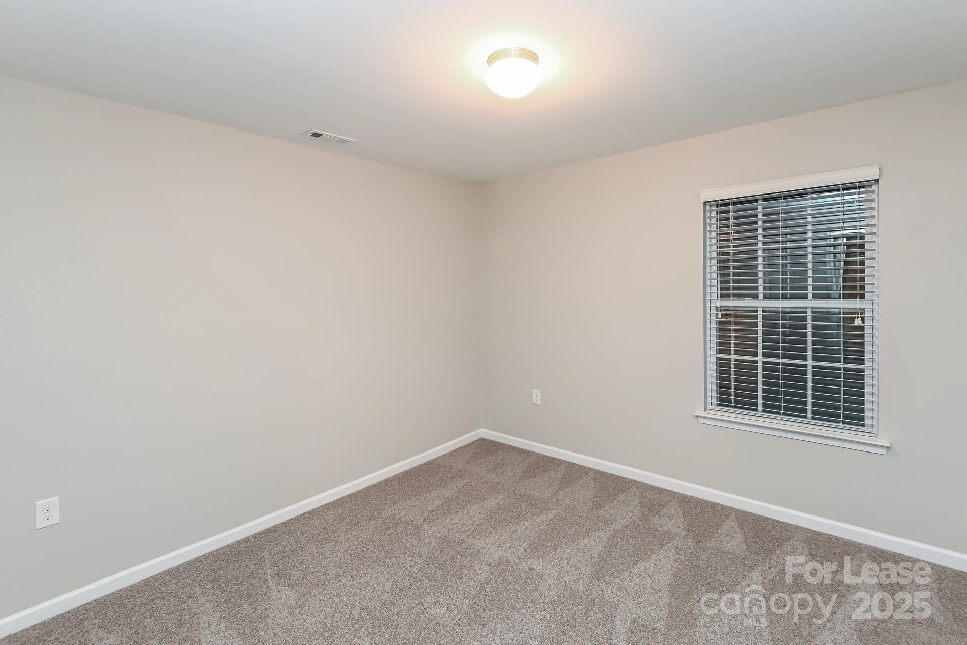 4123 Long Arrow Drive Concord, NC 28025 - Photo 12 of 17 an empty room with a window