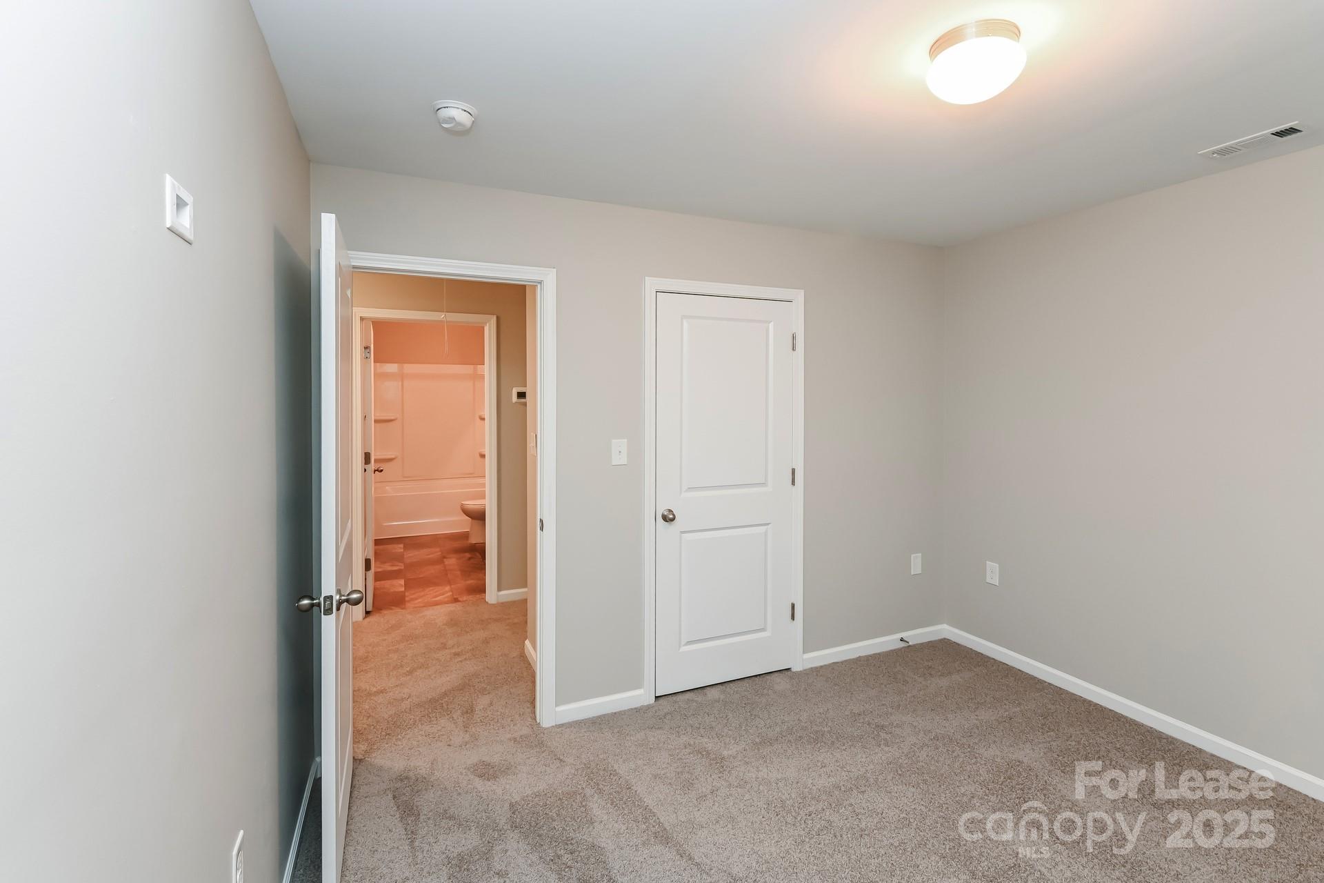4123 Long Arrow Drive Concord, NC 28025 - Photo 10 of 17 an empty room with windows