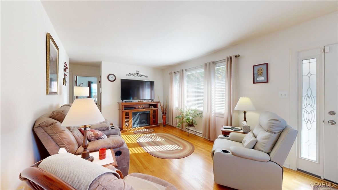 706 James Avenue Colonial Heights, VA 23834 - Photo 4 of 14 a living room with furniture and a flat screen tv