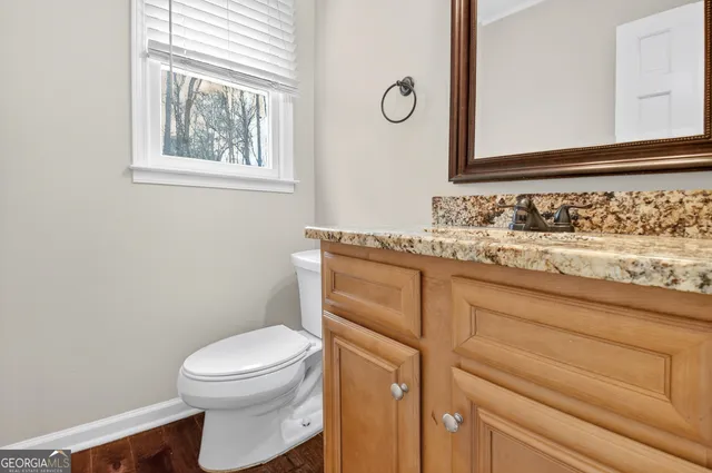 a workspace with furniture and wooden floor