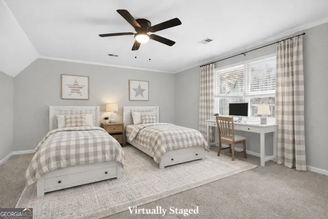 a house that has a tree in front of it