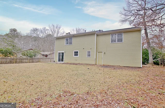 a table and chairs sitting in the patio