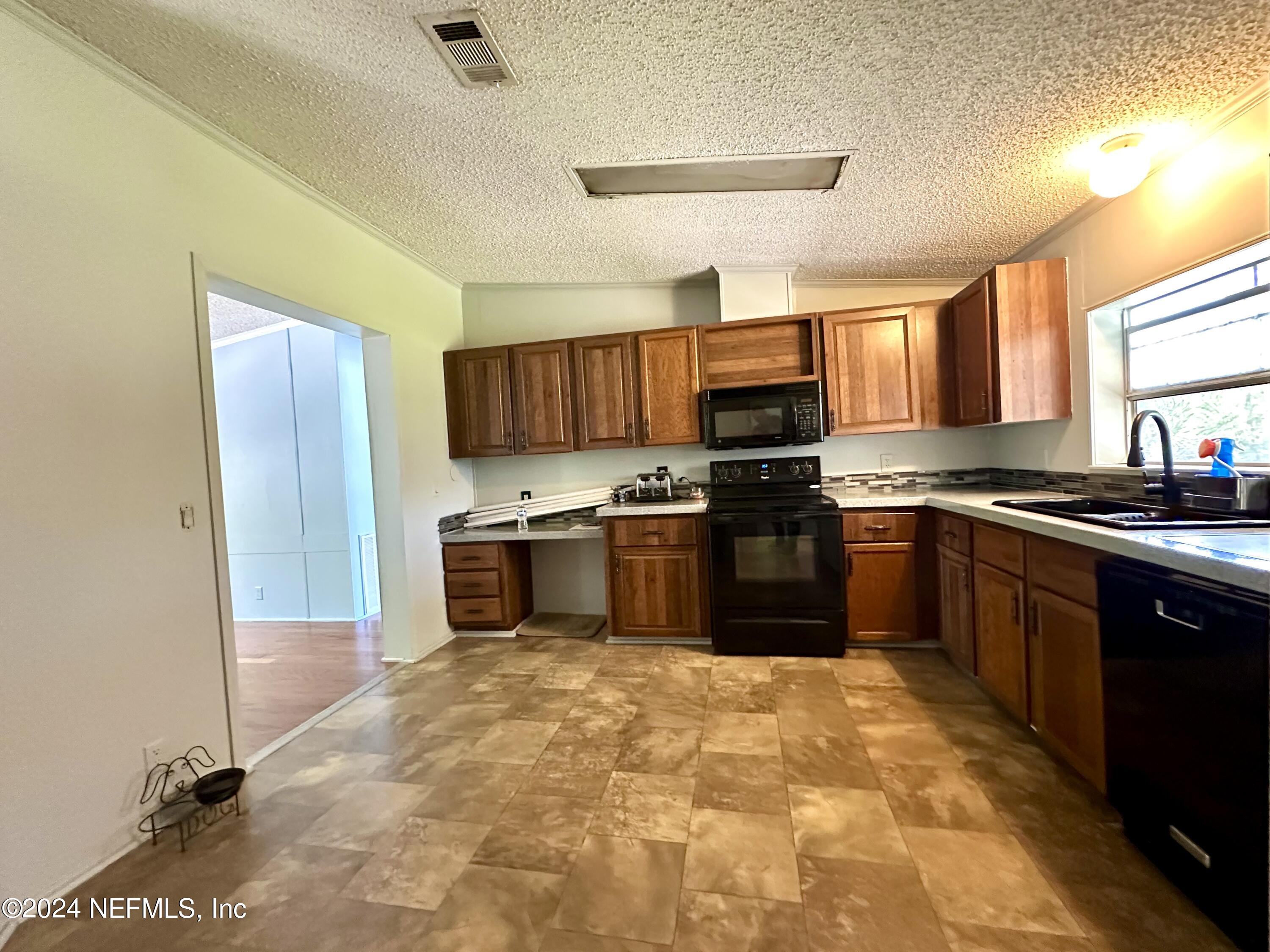 8026 Old Plank Road Jacksonville, FL 32220 - Photo 6 of 28 FullSizeRender