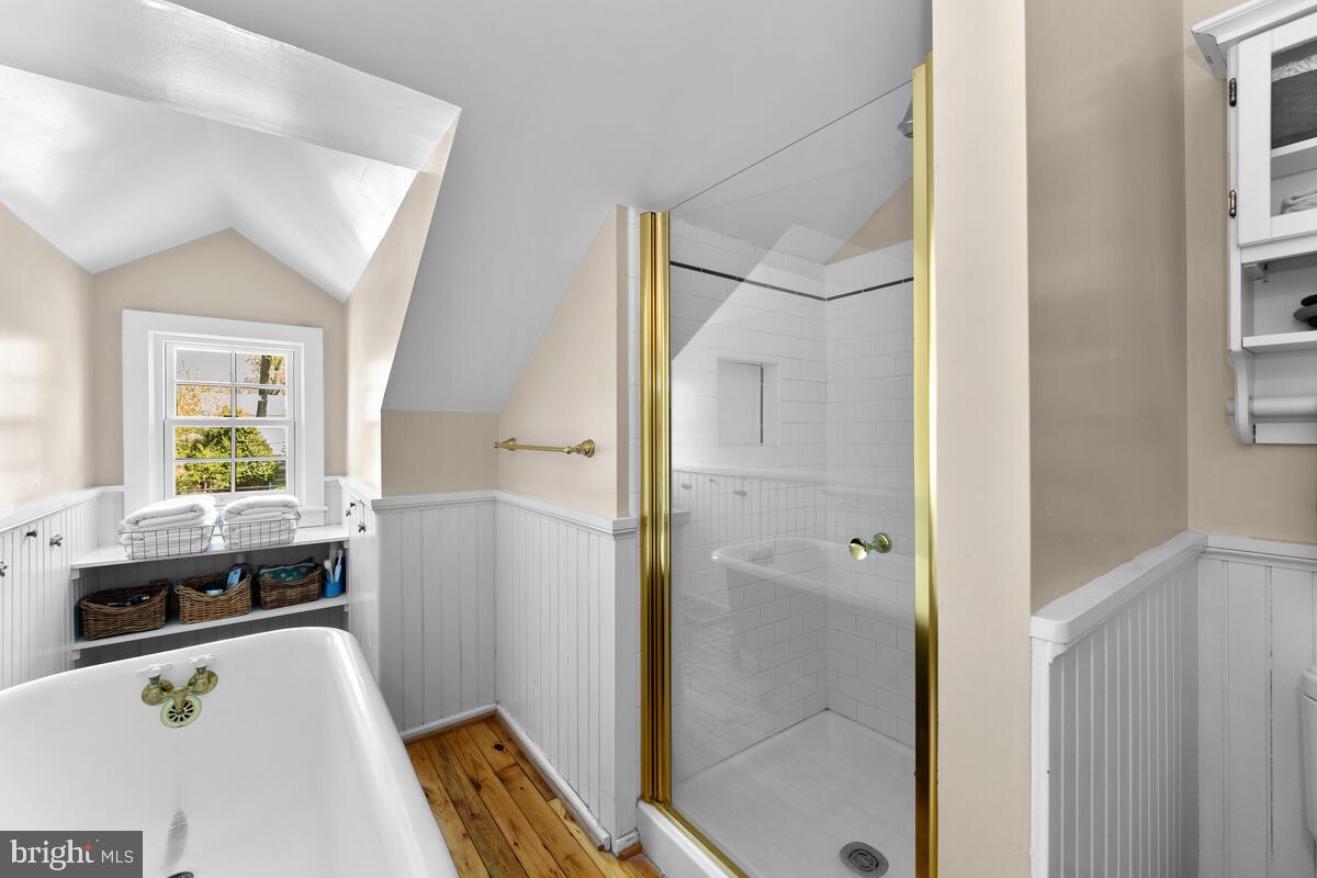 17 Sunnyside Road Silver Spring, MD 20910 - Photo 28 of 50 a bathroom with a tub and shower