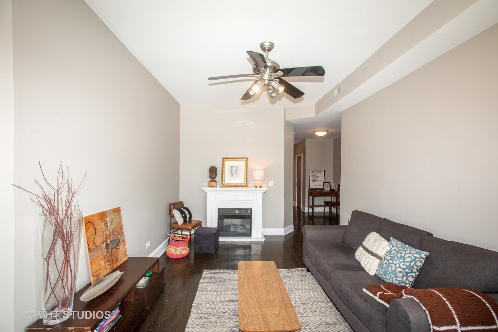 4631 South Indiana Avenue, Unit 3N Chicago, IL 60653 - Photo 3 of 11 a living room with furniture and a fireplace