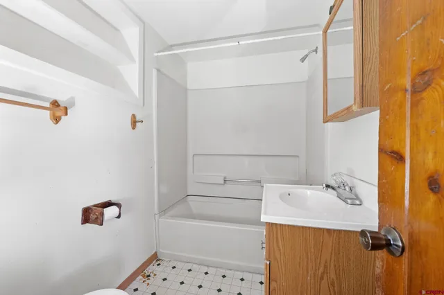 a bathroom with a sink and a toilet