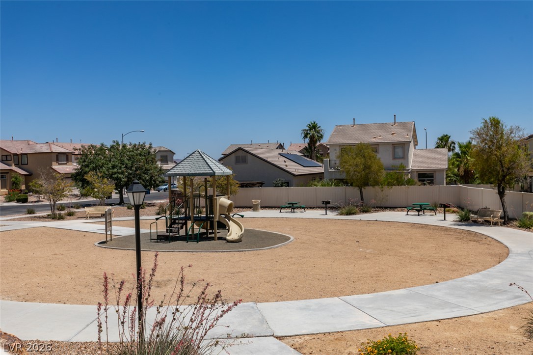 5150 Riverside Run Court North Las Vegas, NV 89081 - Photo 49 of 50 A community park with a playground and picnic areas, perfect for family enjoyment.