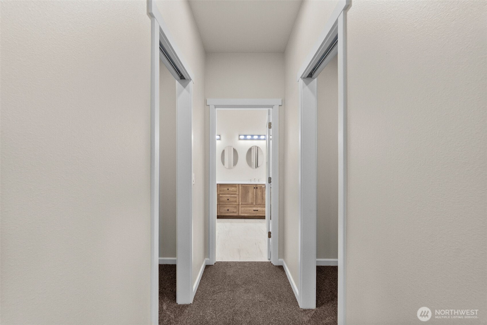 6123 186th Trail Southwest Rochester, WA 98579 - Photo 17 of 35 a view of a hallway with wooden floor and entryway