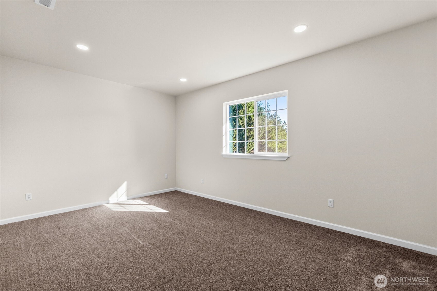 6123 186th Trail Southwest Rochester, WA 98579 - Photo 20 of 35 an empty room with windows