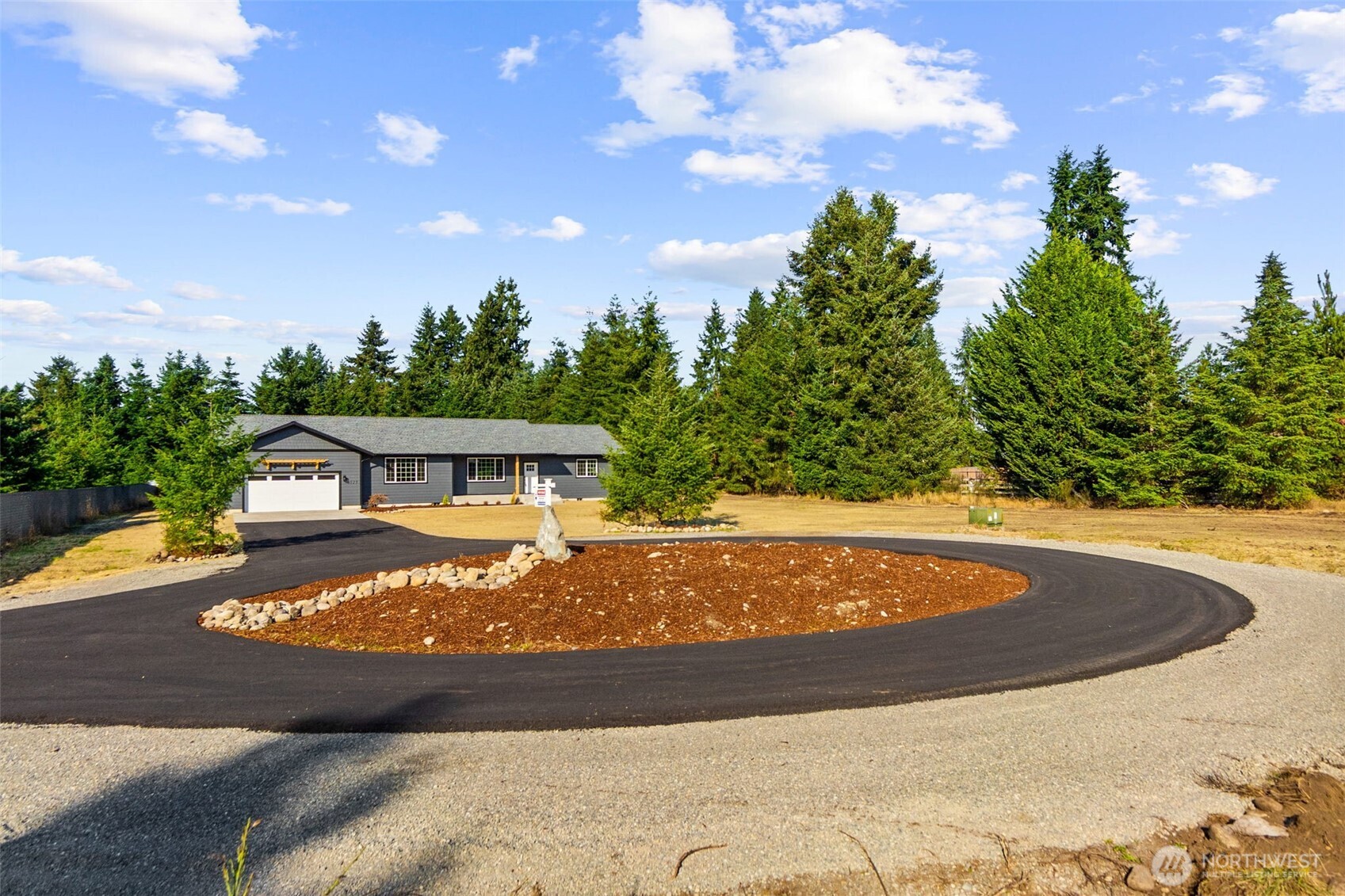 6123 186th Trail Southwest Rochester, WA 98579 - Photo 35 of 35 a view of a house with a yard