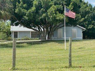8650 Southwest Springhaven Avenue Indiantown, FL 34956 - Photo 1 of 6 Front View