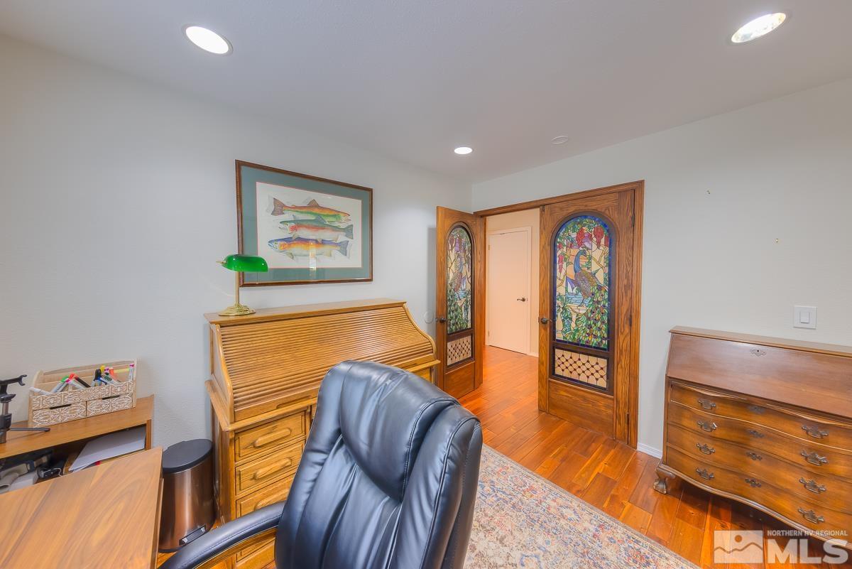 858 Lighthouse Court Reno, NV 89511 - Photo 14 of 39 a living room with furniture and a flat screen tv