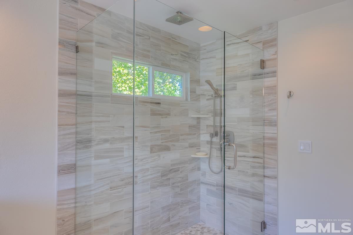 858 Lighthouse Court Reno, NV 89511 - Photo 24 of 39 a bathroom with a shower