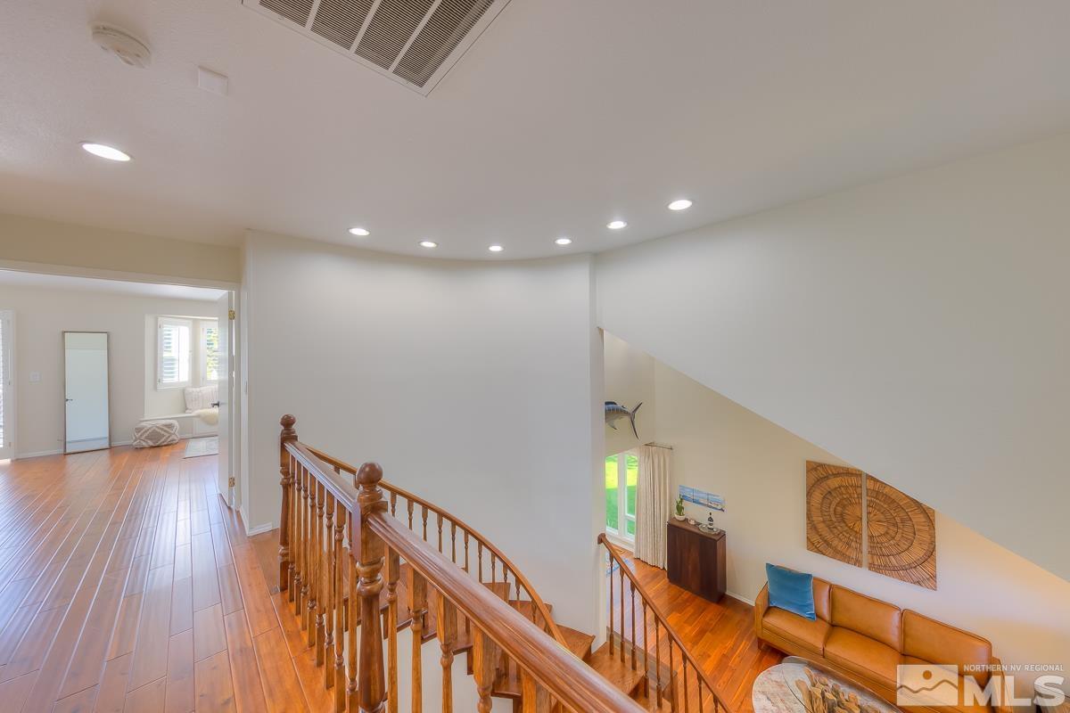 858 Lighthouse Court Reno, NV 89511 - Photo 28 of 39 a view of a hallway with wooden floor