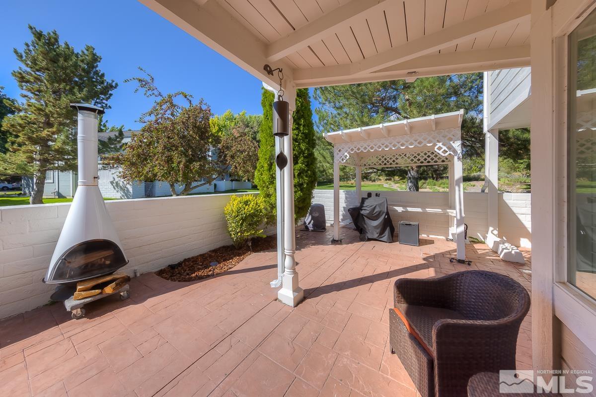 858 Lighthouse Court Reno, NV 89511 - Photo 33 of 39 a balcony with furniture and a potted plant