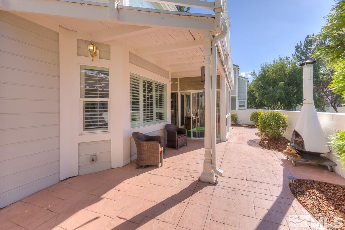 858 Lighthouse Court Reno, NV 89511 - Photo 34 of 39 a building outdoor space with patio furniture and potted plants