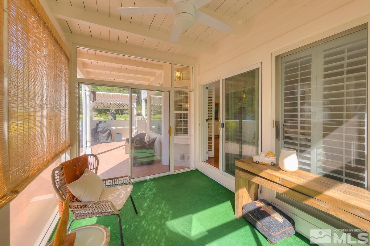 858 Lighthouse Court Reno, NV 89511 - Photo 36 of 39 a living room with furniture and a table