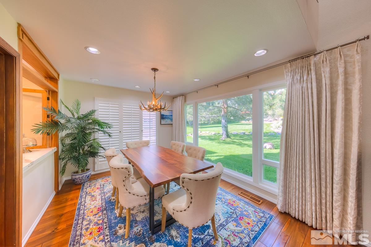 858 Lighthouse Court Reno, NV 89511 - Photo 7 of 39 a living room with furniture and a large window