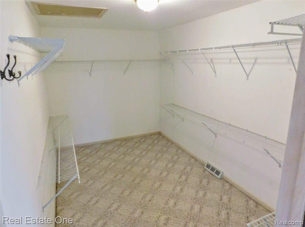 28020 Haas Road Wixom, MI 48393 - Photo 33 of 53 Master Closet.jpg