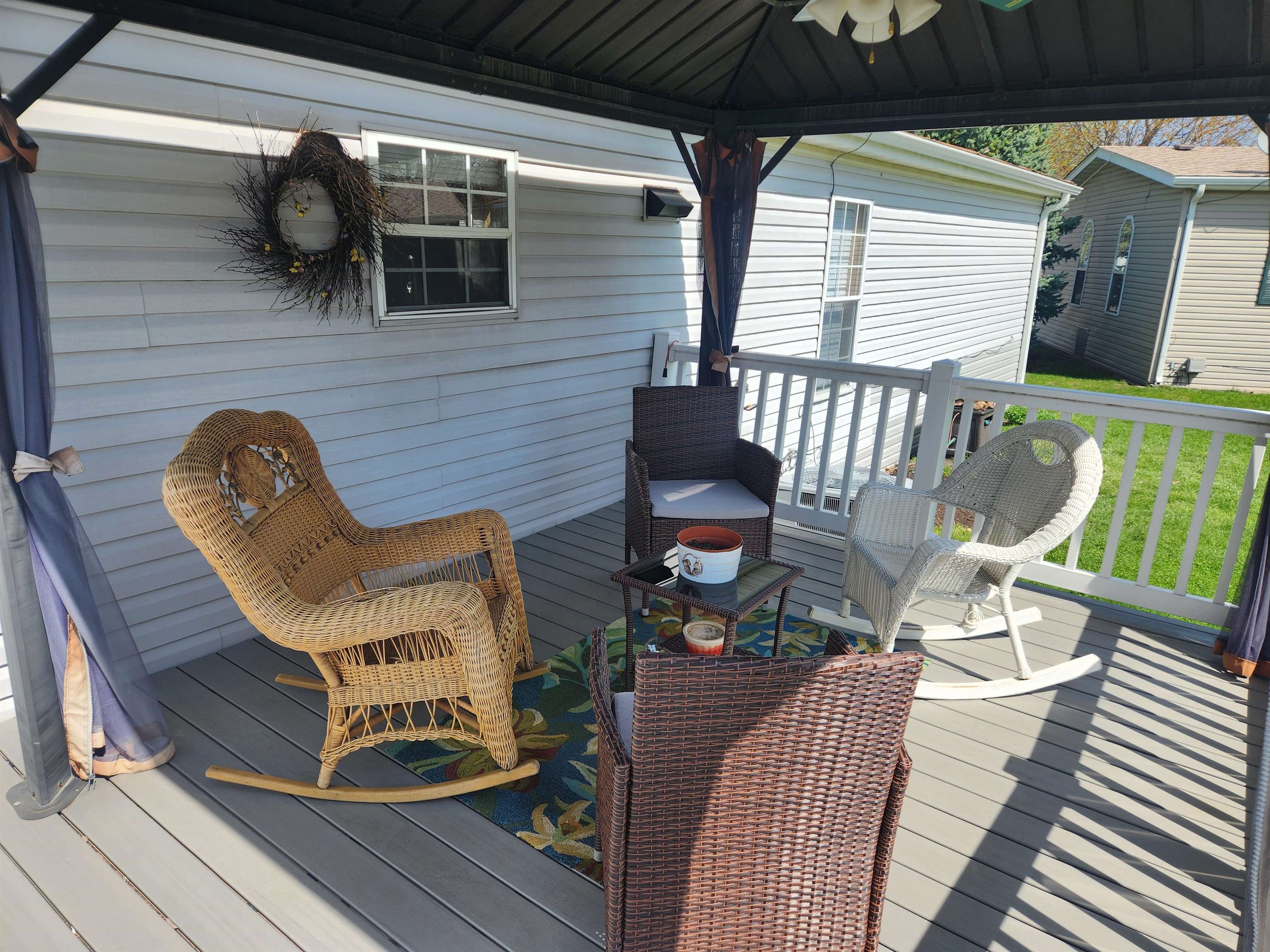 8511 Fig Tree Lane Roscoe, IL 61073 - Photo 31 of 35 a view of outdoor seating space and deck