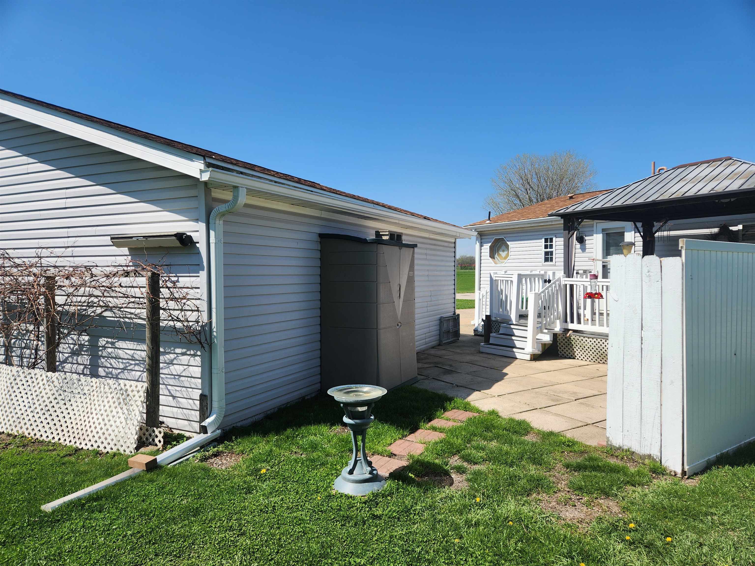8511 Fig Tree Lane Roscoe, IL 61073 - Photo 35 of 35 a front view of a house with garden