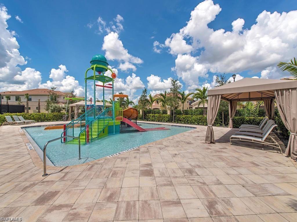 13459 Sumter Lane Naples, FL 34109 - Photo 30 of 40 a view of a playground with basketball court