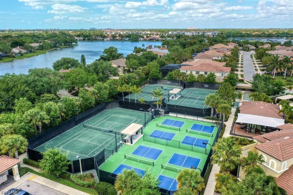 13459 Sumter Lane Naples, FL 34109 - Photo 38 of 40 an aerial view of residential houses with outdoor space and river