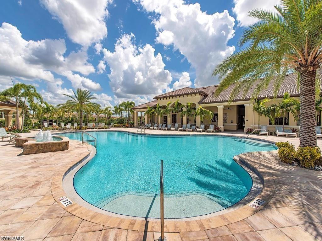 13459 Sumter Lane Naples, FL 34109 - Photo 39 of 40 a view of a swimming pool is middle in the garden