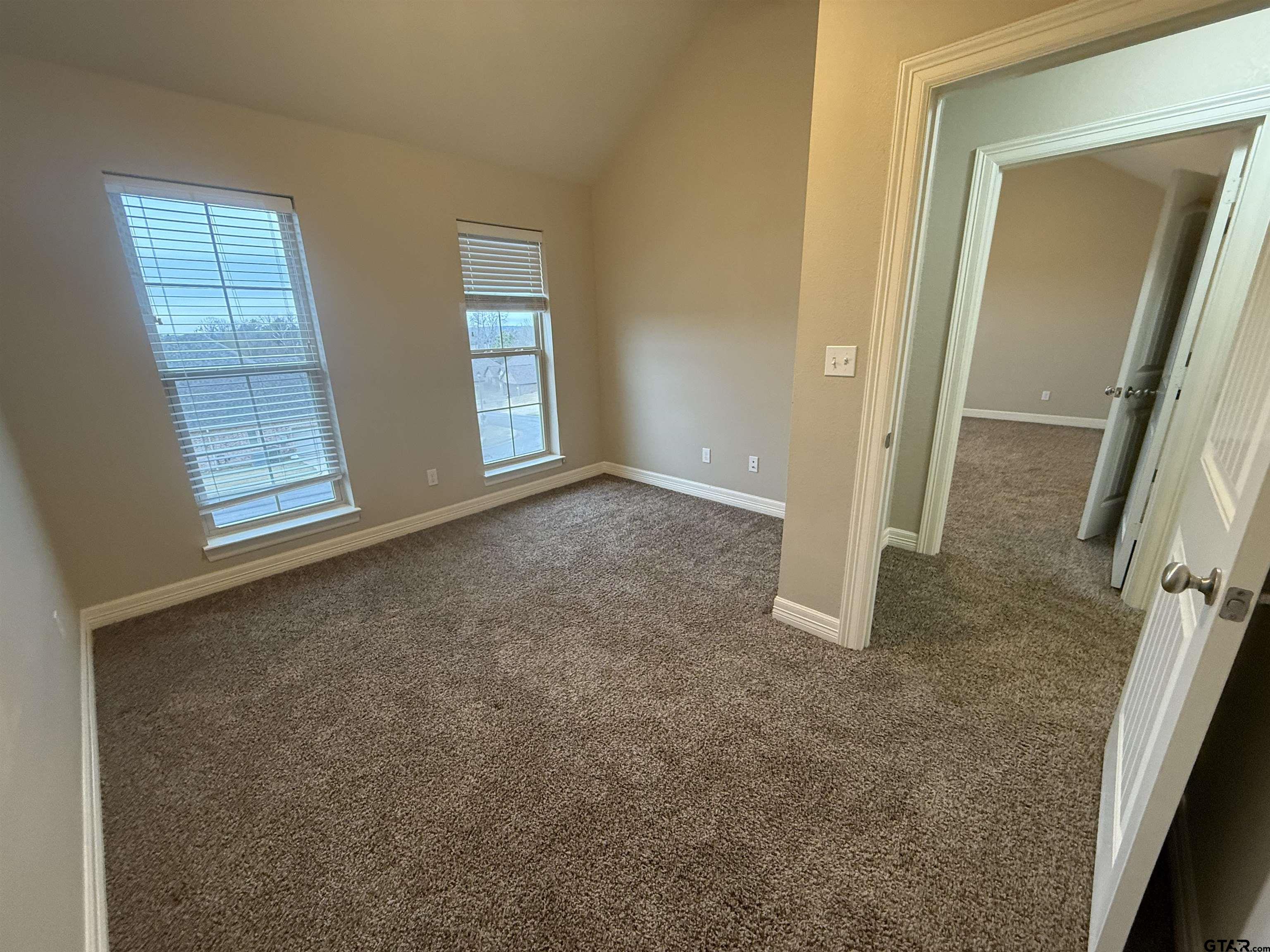 16440 County Road 178, Unit 1007 Tyler, TX 75703 - Photo 21 of 25 an empty room with windows