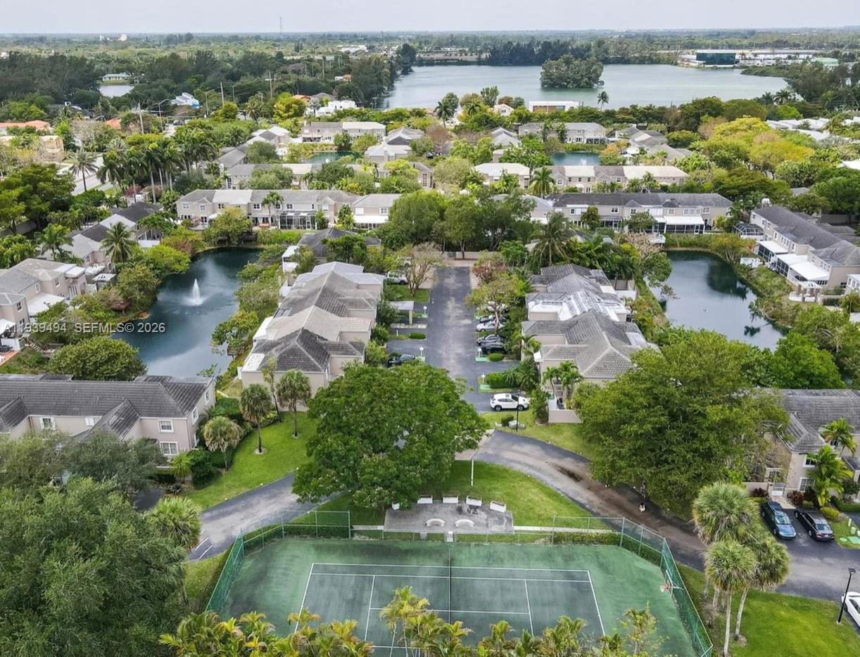 6950 Southwest 55th Terrace East Miami, FL 33155 - Photo 4 of 16 an aerial view of residential houses with outdoor space and river