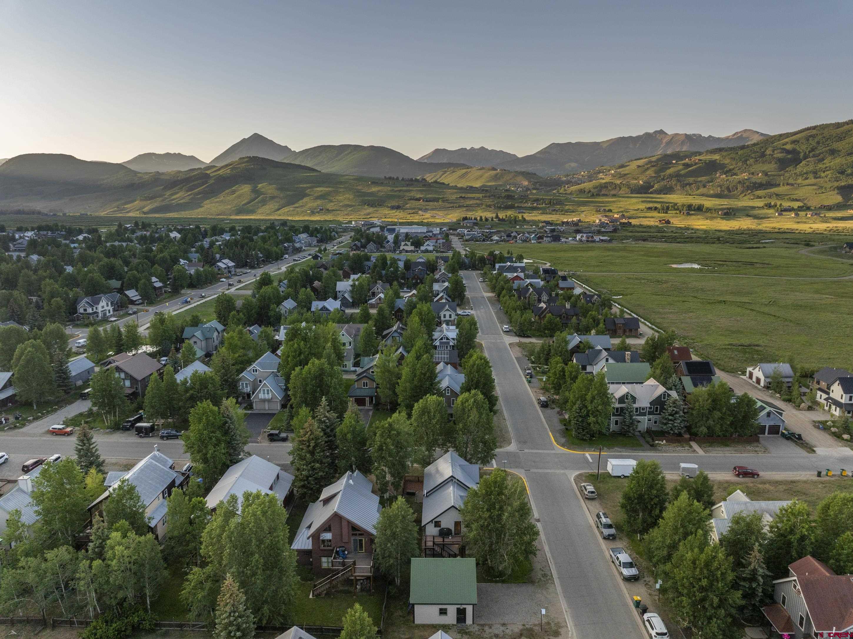 705 9th Street Crested Butte, CO 81224 - Photo 14 of 44 an aerial view of residential houses with outdoor space and river