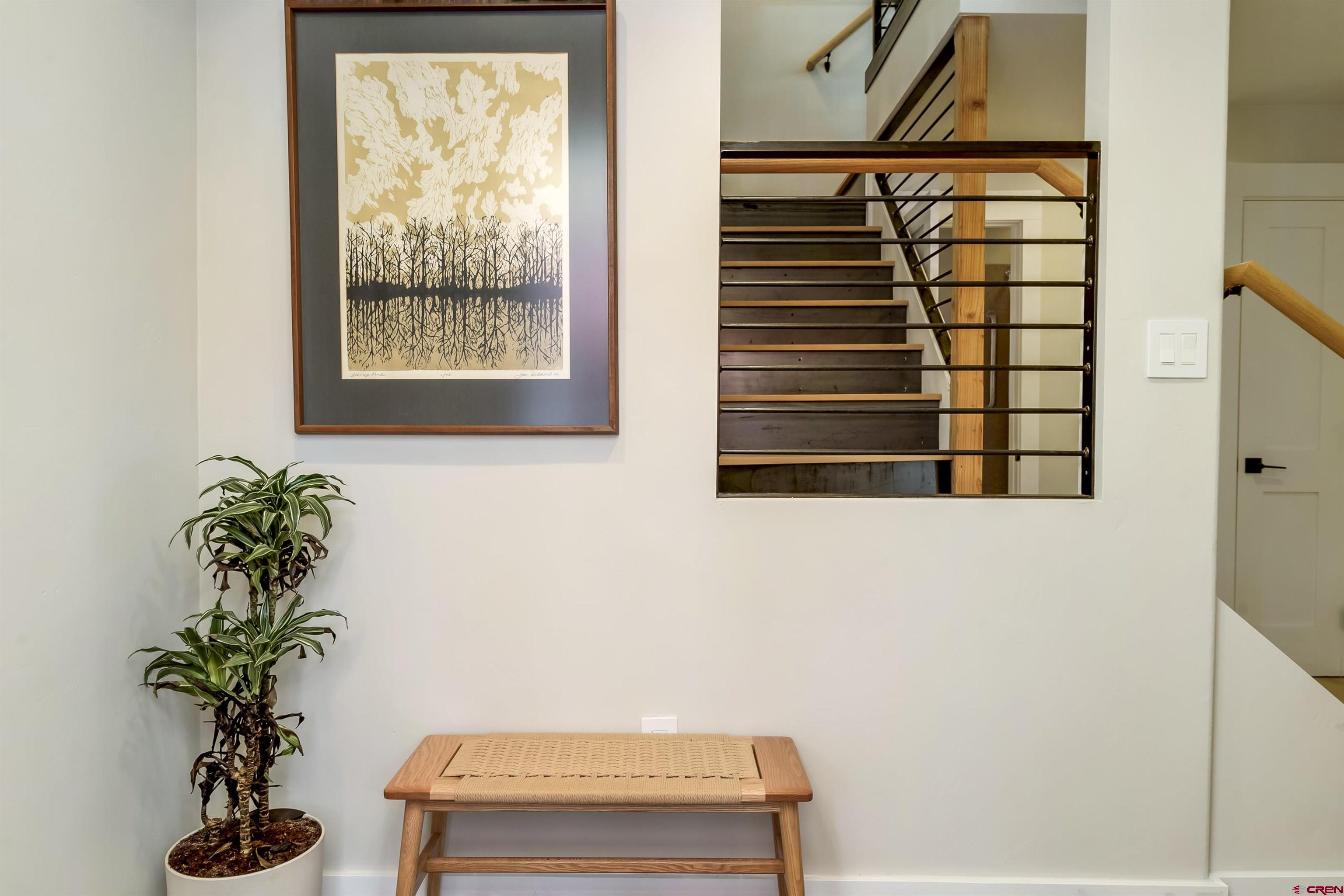 705 9th Street Crested Butte, CO 81224 - Photo 17 of 44 a house with trees in front of it