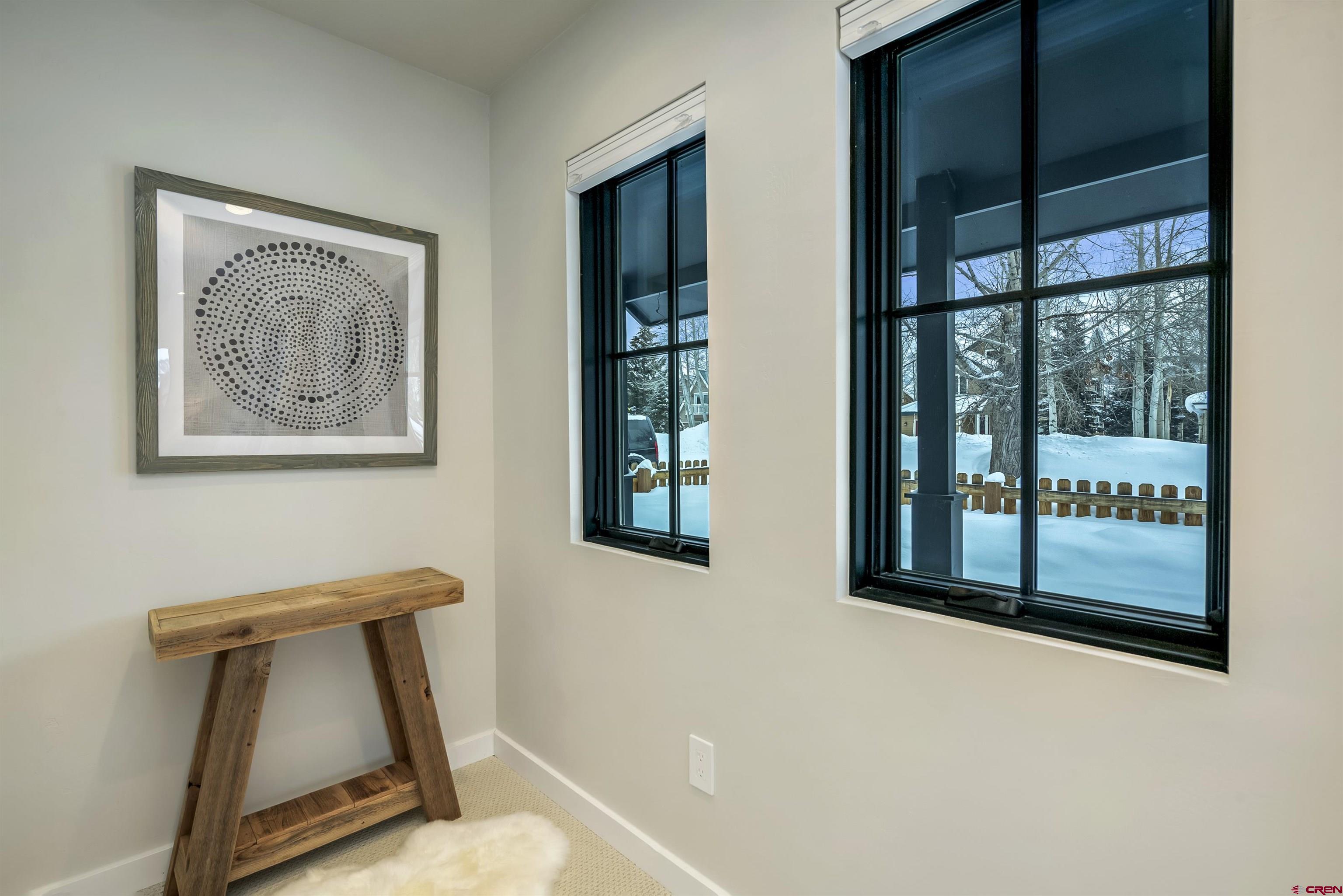 705 9th Street Crested Butte, CO 81224 - Photo 28 of 44 a view of a room with door and a window