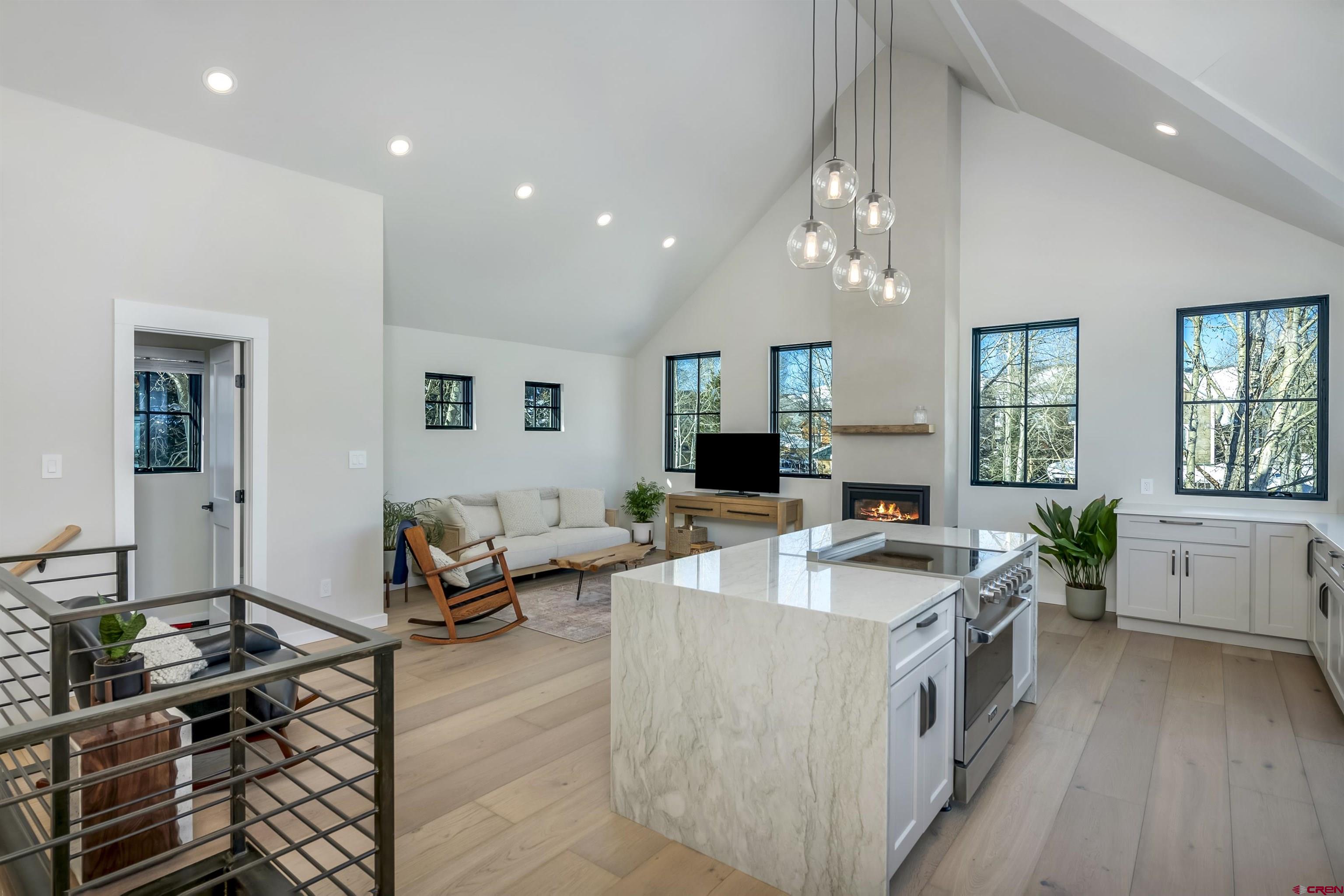 705 9th Street Crested Butte, CO 81224 - Photo 31 of 44 a large white kitchen with lots of counter space