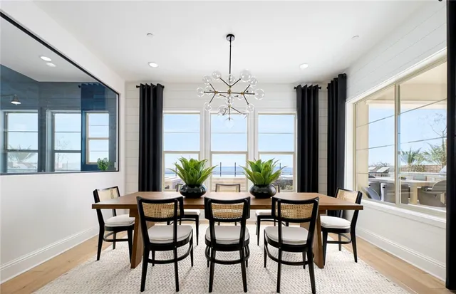 a view of a dining room with furniture window and entryway