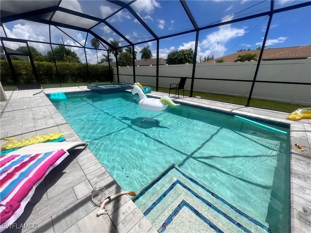 a view of a backyard with a patio