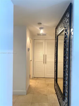 a view of entryway with a bathroom