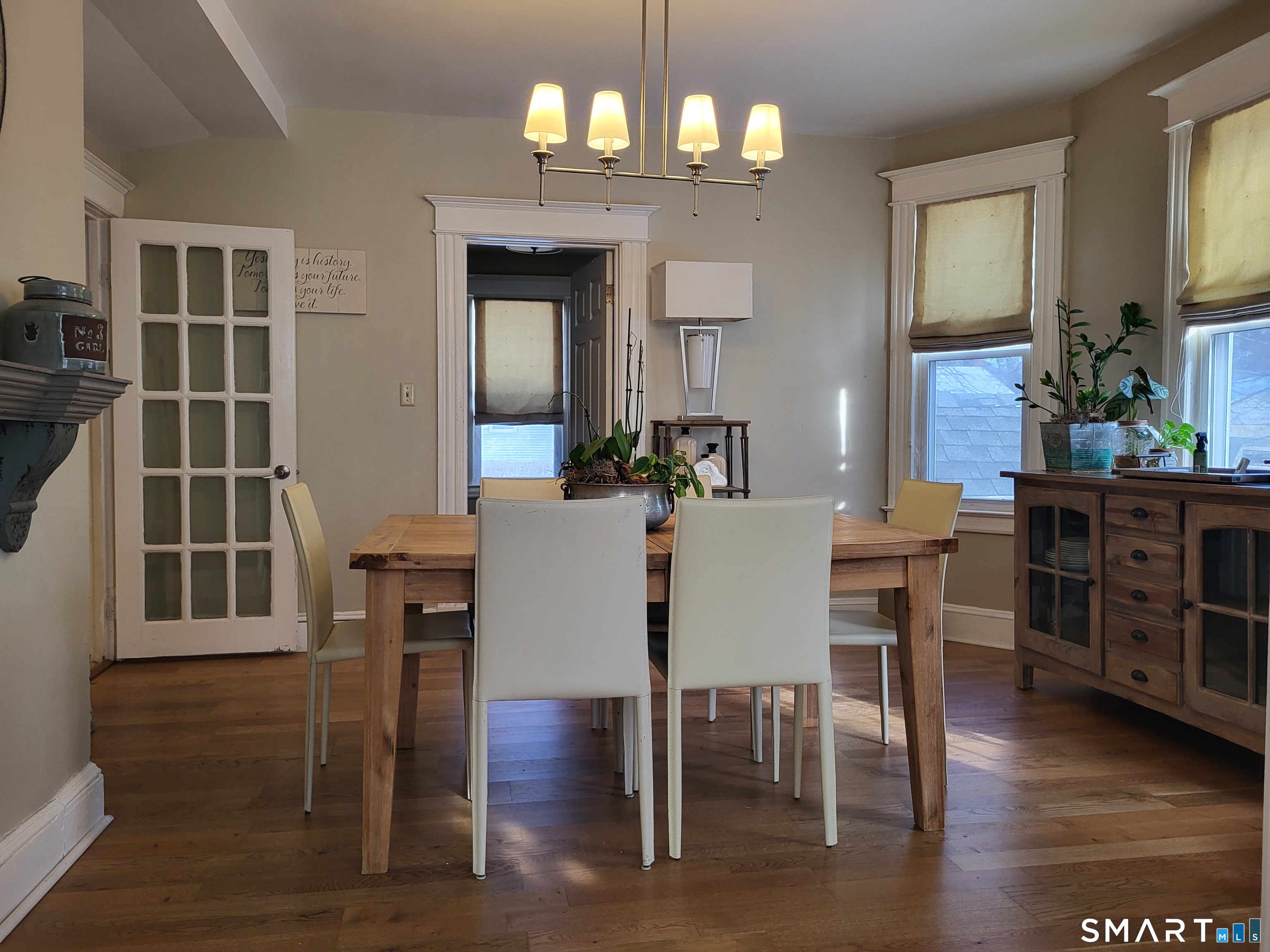 110 Darby Street Bloomfield, CT 06002 - Photo 15 of 39 a view of a dining room with furniture and wooden floor