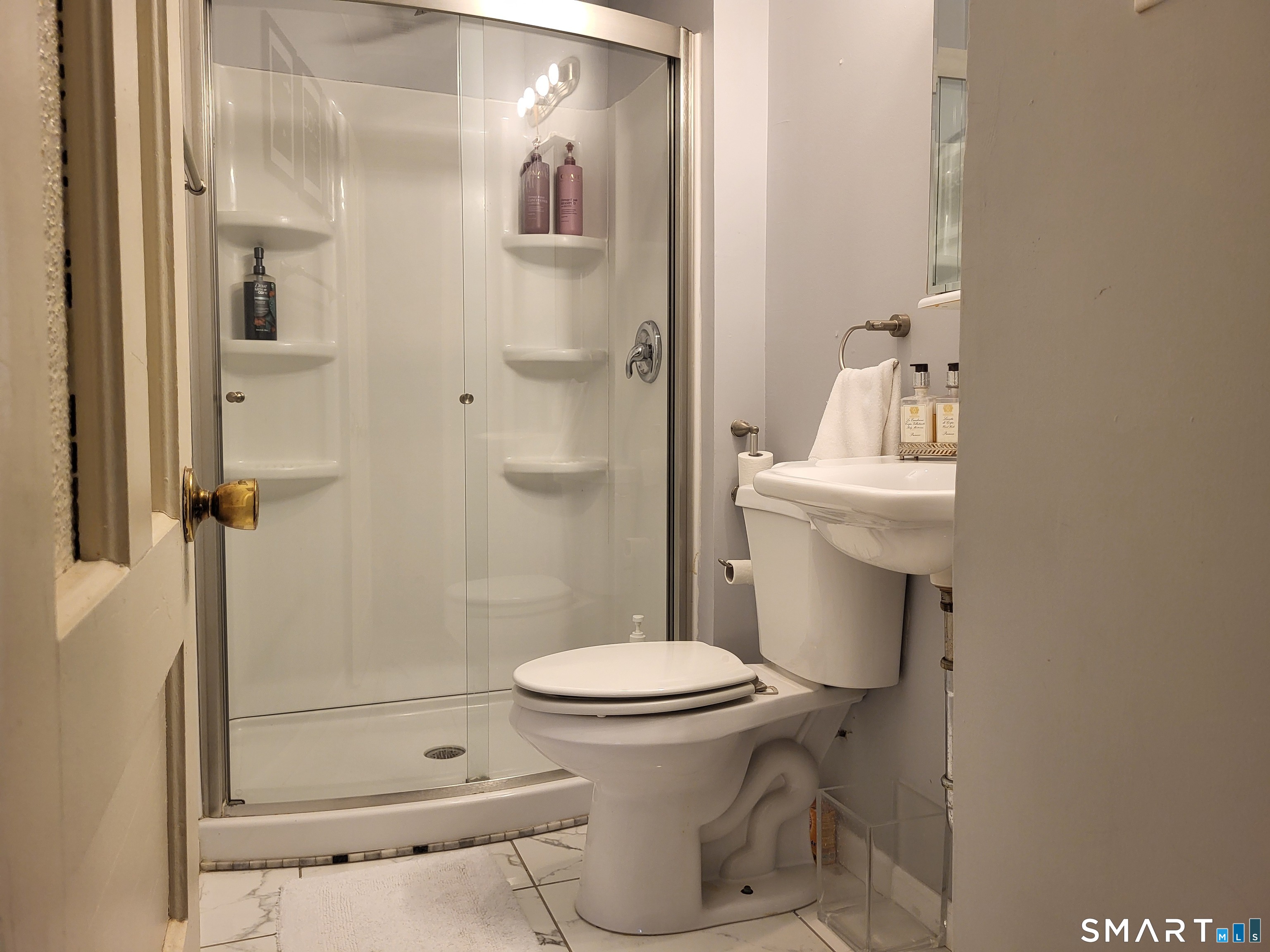 110 Darby Street Bloomfield, CT 06002 - Photo 18 of 39 a bathroom with a toilet and a shower