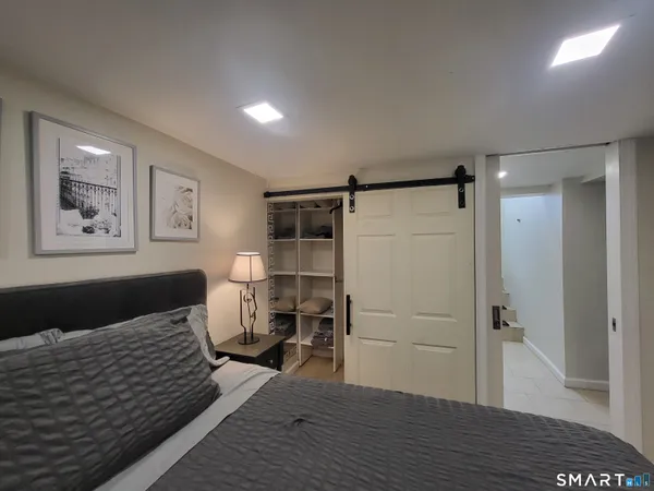 a bathroom with a mirror and a sink