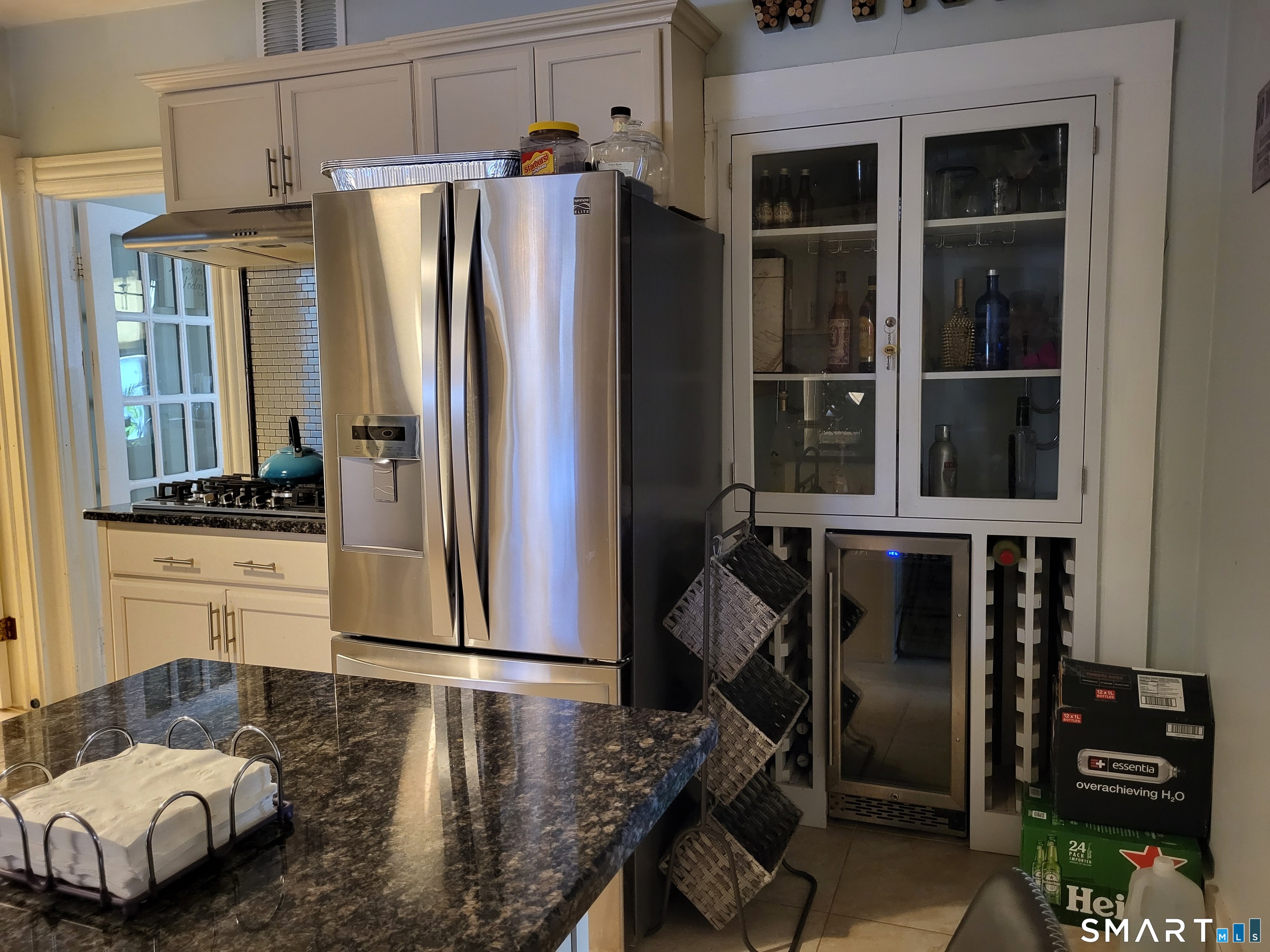 110 Darby Street Bloomfield, CT 06002 - Photo 8 of 39 a kitchen with stainless steel appliances granite countertop a refrigerator and a stove