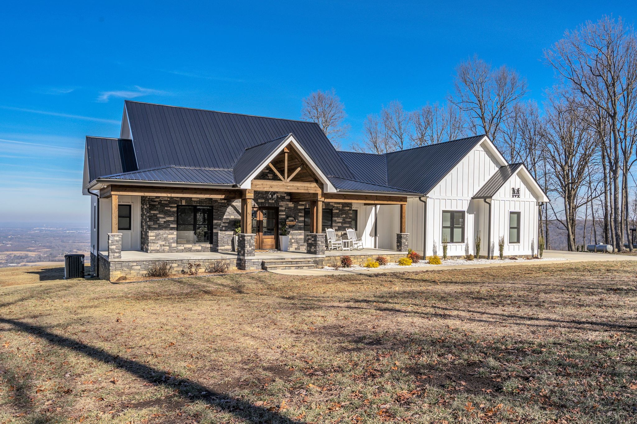 903 Box House Road Belvidere, TN 37306 - Photo 6 of 43 a front view of a house with a yard