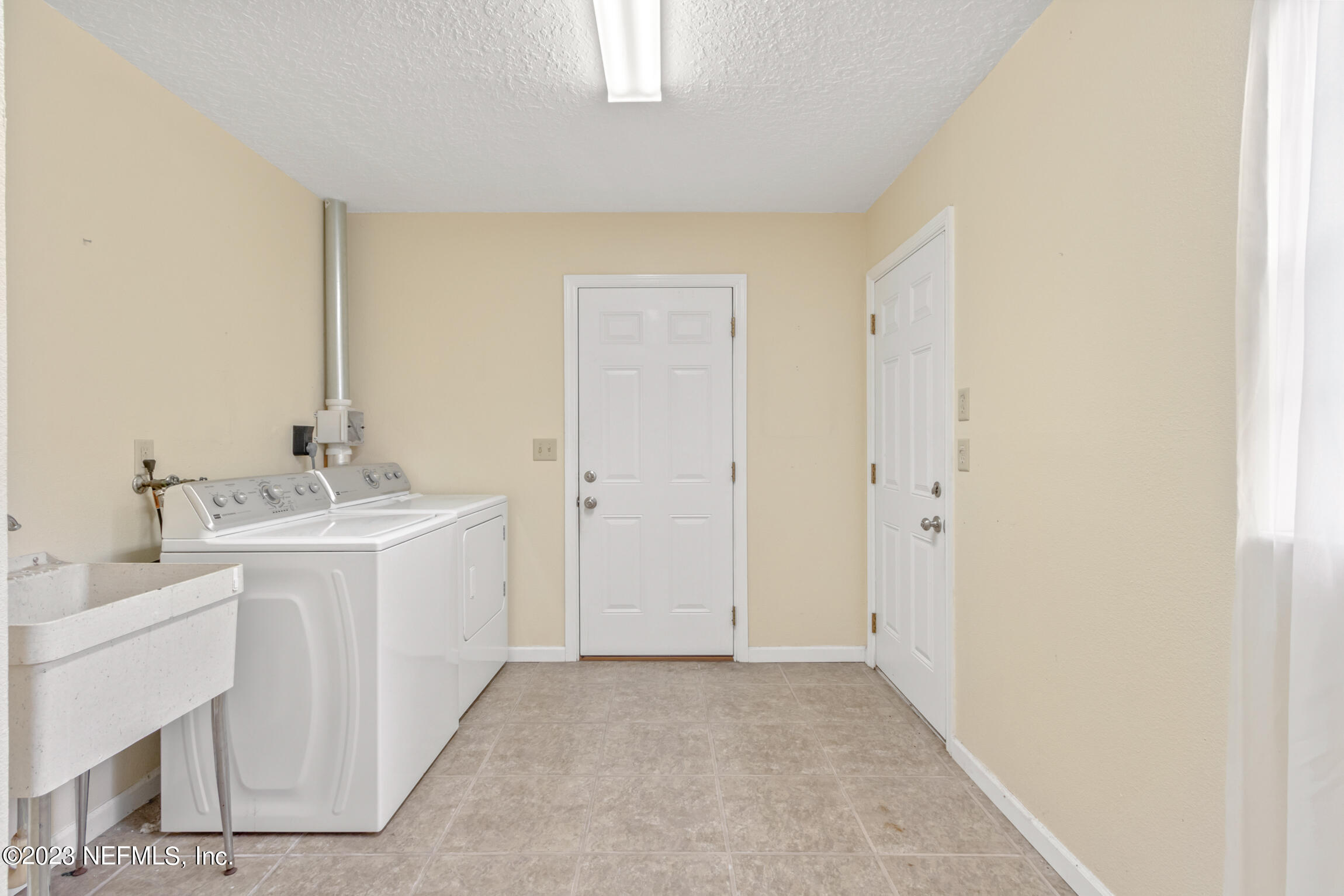 20 Pine Valley Circle Ormond Beach, FL 32174 - Photo 25 of 28 Private laundry