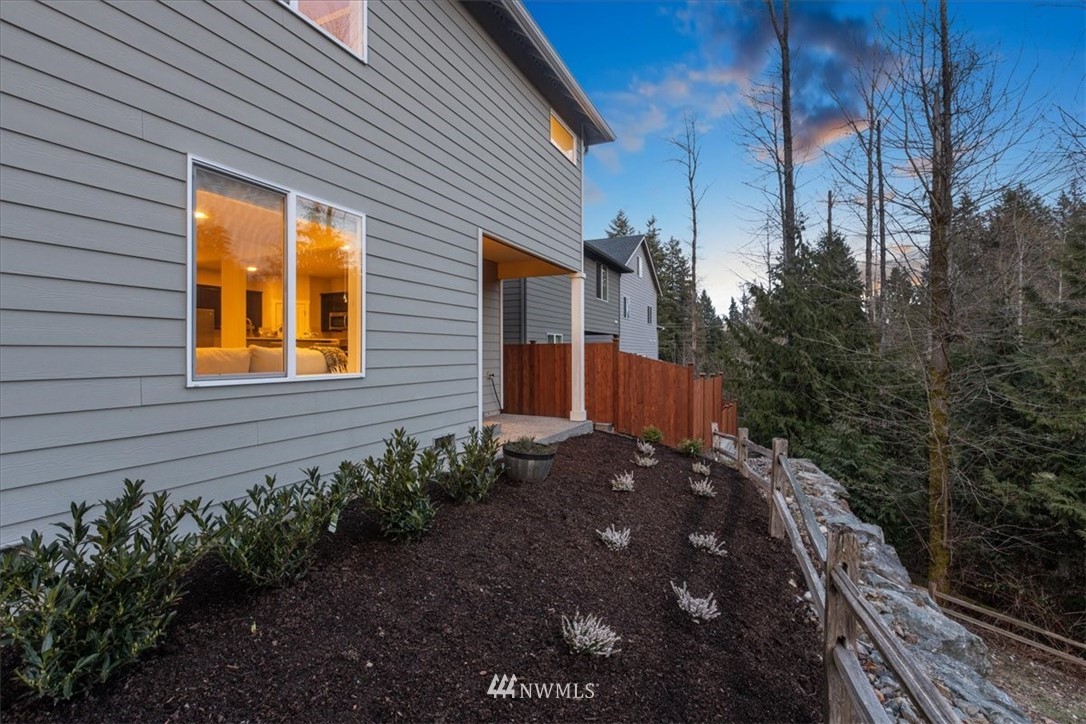 26 157th Lane Southeast Bothell, WA 98012 - Photo 36 of 37 a view of a house with a yard