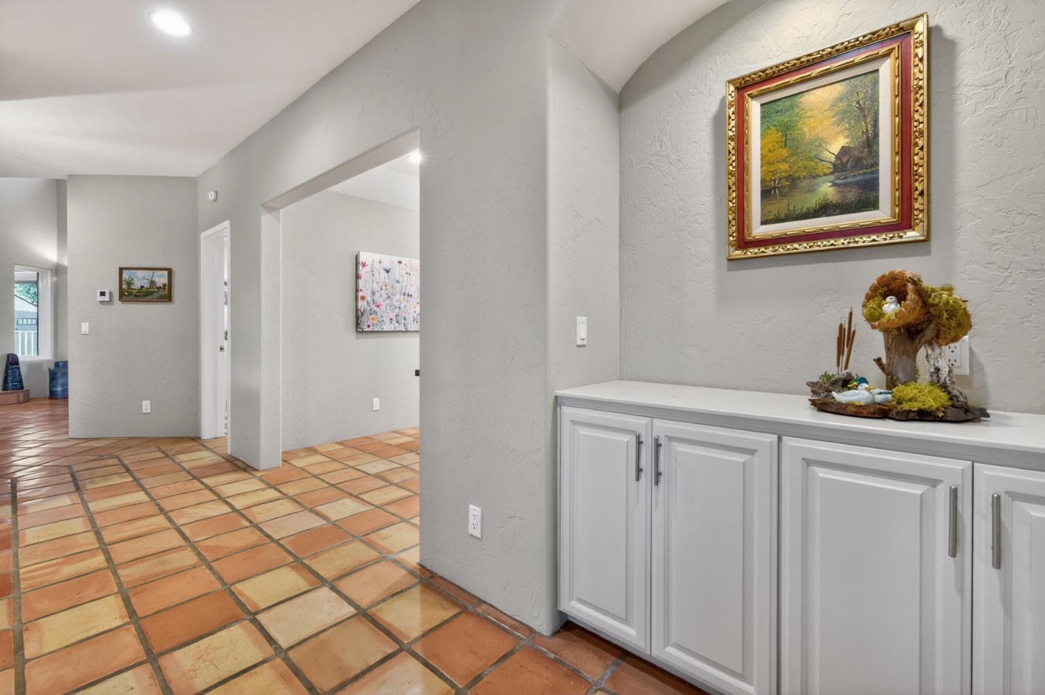 7570 Airola Road Vallecito, CA 95251 - Photo 37 of 90 a bedroom with a bed and painting on the wall