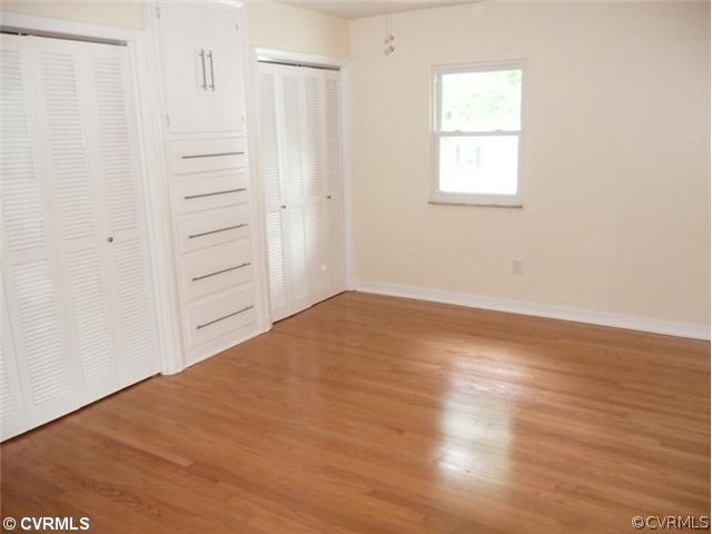 8127 Lethbridge Road Richmond, VA 23235 - Photo 5 of 12 Master Bedroom - This Bedroom is Wonderful and Features Double Closets, Hardwood Floors and Built-in Cabinets. As you can notice, the Owner Put a lot of Thought into this Massive Renovation!